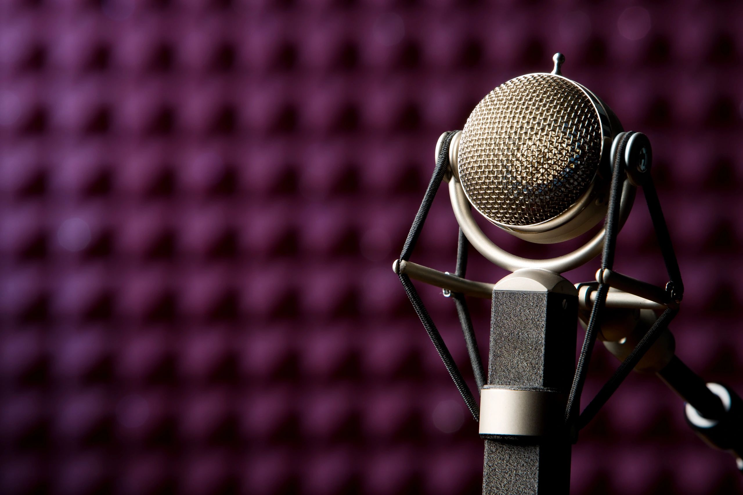 Studio microphone representing commentary and podcast topics